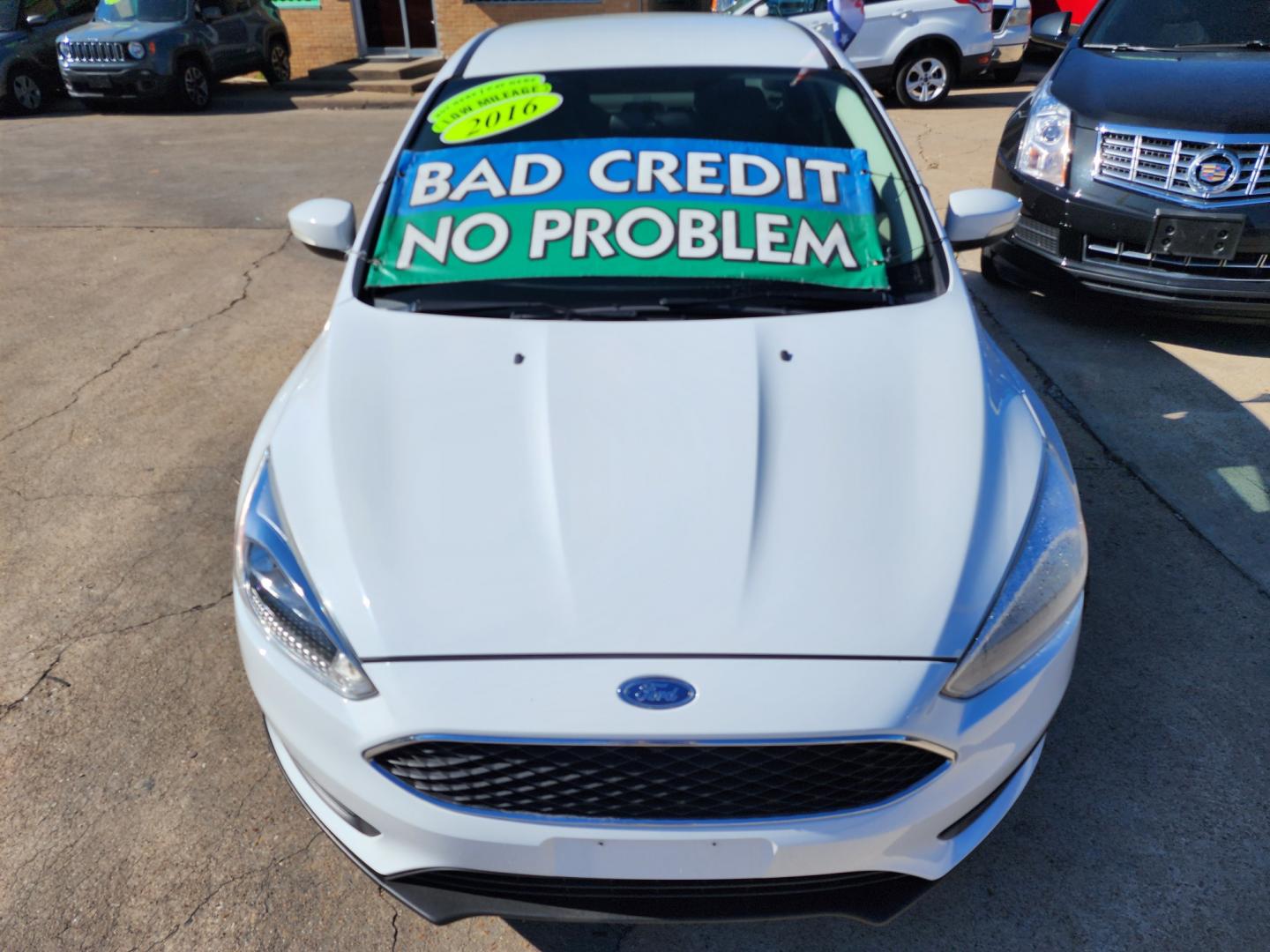 2016 WHITE Ford Focus SE (1FADP3F24GL) with an 2.0L L4 DOHC 16V engine, AUTO transmission, located at 2660 S.Garland Avenue, Garland, TX, 75041, (469) 298-3118, 32.885551, -96.655602 - Welcome to DallasAutos4Less, one of the Premier BUY HERE PAY HERE Dealers in the North Dallas Area. We specialize in financing to people with NO CREDIT or BAD CREDIT. We need proof of income, proof of residence, and a ID. Come buy your new car from us today!! This is a Super Clean 2016 FORD FOCUS - Photo#8